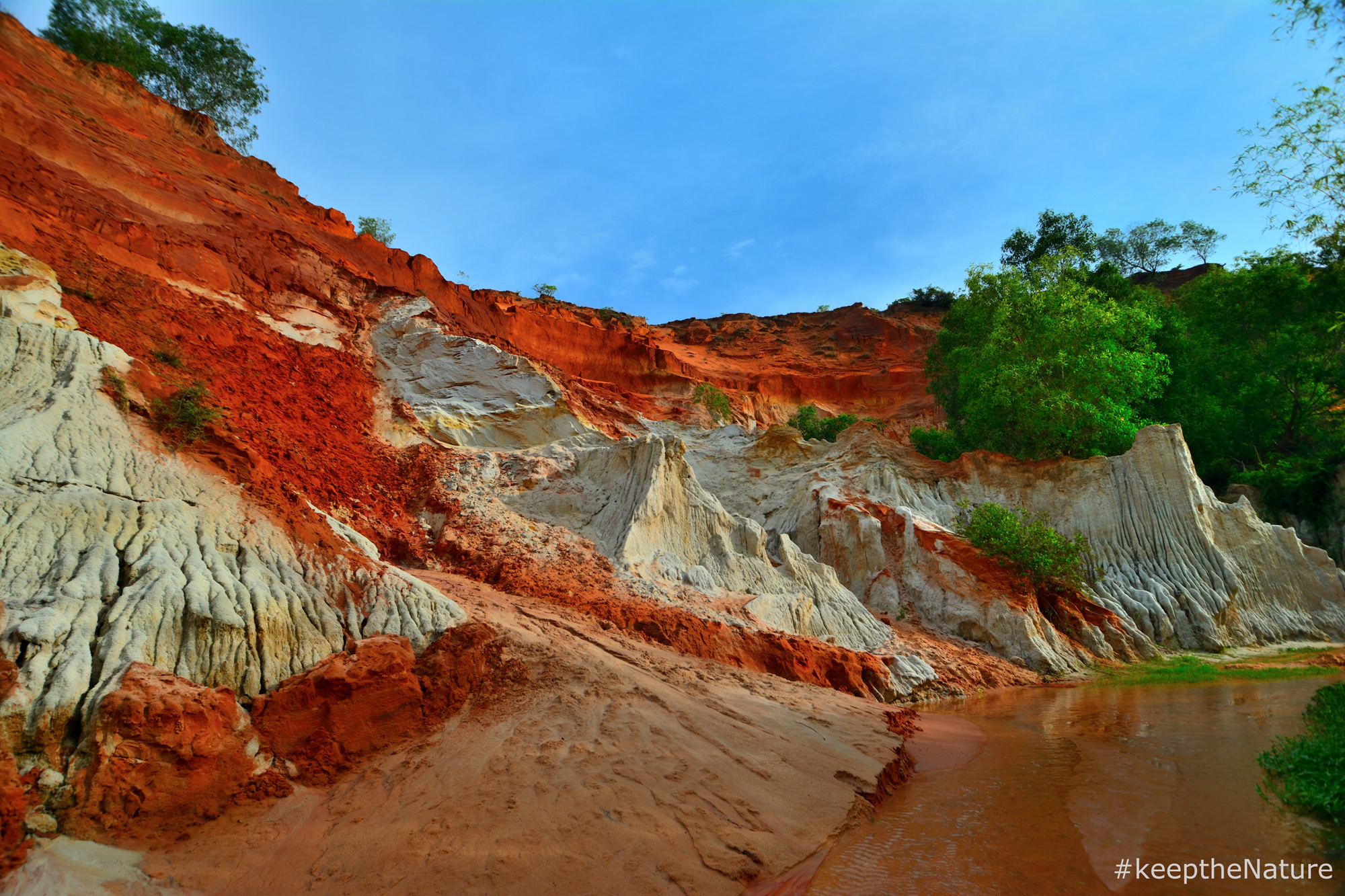 Beautiful nature landscape around Fairy Springs in Mui Ne in Vietnam.  Waterfall in the red sands Stock Photo